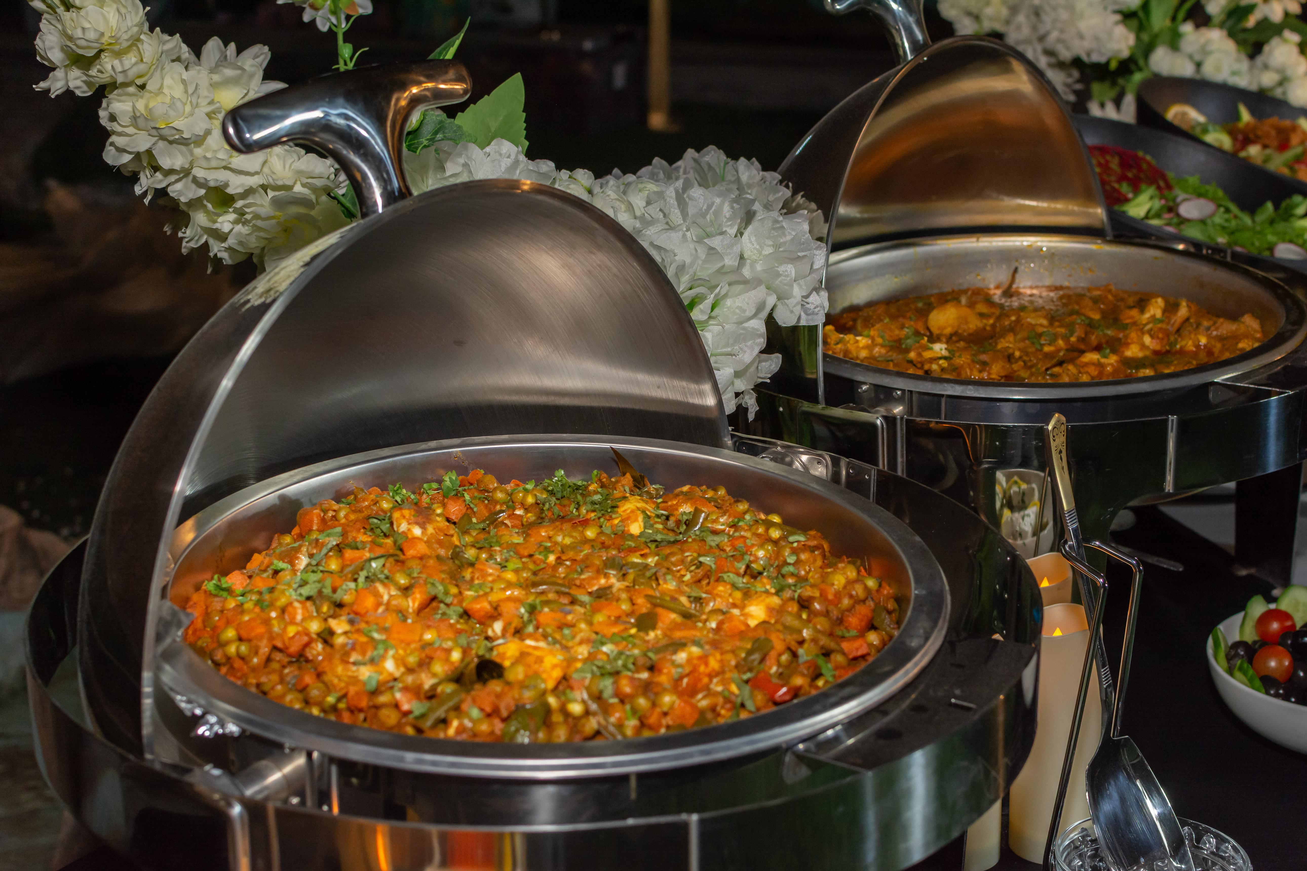Catering dishes prepared by Taj Indian Fusion
